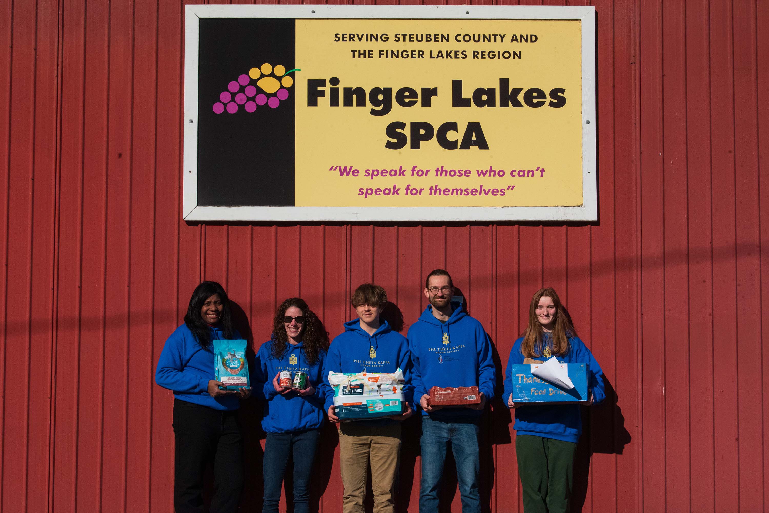 PTK students donating supplies at SPCA