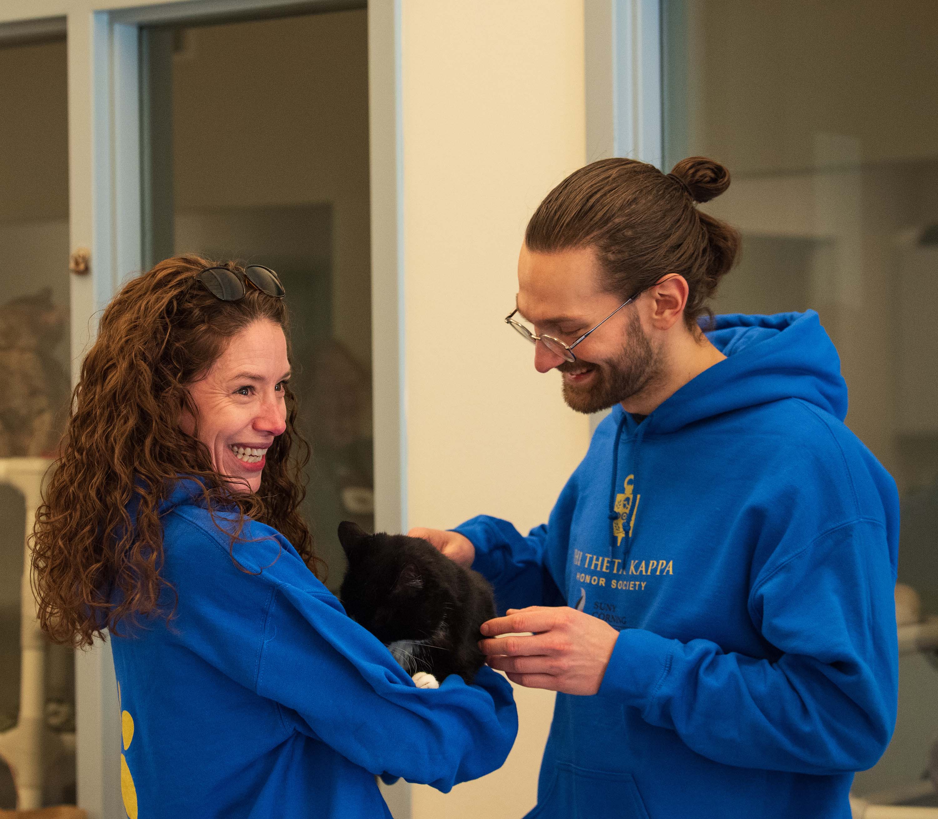 PTK students with cat at SPCA