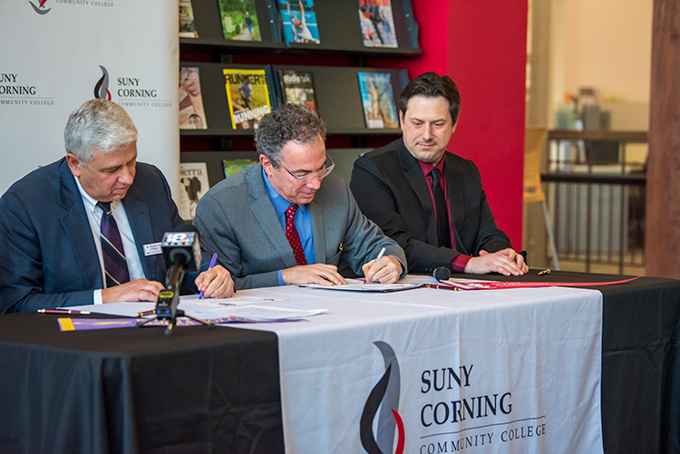 dr. mullaney signing articulation agreement