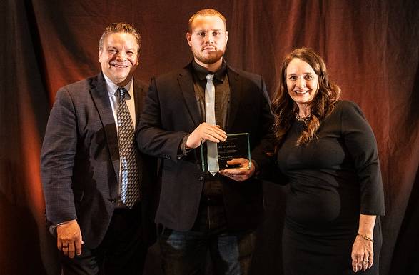 mark bellinger receiving award from chemung chamber of commerce